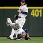 Mariners stave off late Athletics rally, win 6-5