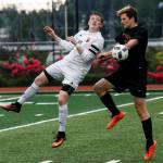 Snohomish&rsquo;s Jason Fairhurst (left) battles for a loose ball with Lakeside&rsquo;s Ben Lewis during a first round 3A state playoff game on May 16, 2017, at Snohomish High School. Snohomish won 5-2. (Ian Terry / The Herald)