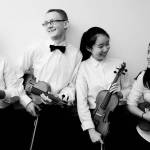 Student musicians with the Everett Youth Symphony Orchestra relax before an earlier performance this season. (Everett Youth Synphony Orchestra)