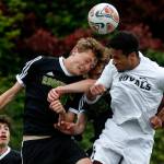Lynnwood&rsquo;s Ryley Johnson (right) goes up for a header with Roosevelt&rsquo;s Brayden Ballman during a first round 3A state playoff game on May 17, 2017, at Edmonds Stadium. (Ian Terry / The Herald)