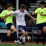 Kamiak&rsquo;s Harrison Rohrbough (center) is pressured by Todd Beamer&rsquo;s Jordan Carmel (left) and Gregorio Romero (right) during a 4A state playoff game on May 19, 2017, at Goddard Stadium in Everett. Kamiak lost 2-1 in double overtime. (Ian Terry / The Herald)