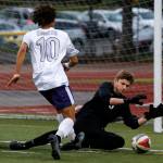 Todd Beamer goalkeeper Brandon Locke (right) stops a shot attempt by Kamiak&rsquo;s Andre&rsquo; Hamilton during a 4A state playoff game on May 19, 2017, at Goddard Stadium in Everett. Kamiak lost 2-1 in double overtime. (Ian Terry / The Herald)