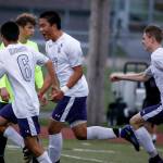 Kamiak&rsquo;s Jason Kim (center left) celebrates his goal in the first half of a 4A state playoff game against Todd Beamer on May 19, 2017, at Goddard Stadium in Everett. Kamiak lost 2-1 in double overtime. (Ian Terry / The Herald)
