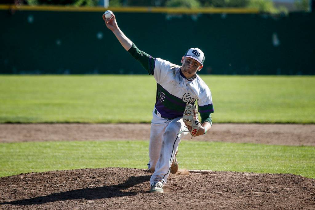 Edmonds-Woodway pitcher Kosta Cooper delivers a pitch during a 3A state playoff game against Arlington on May 20, 2017, at Dream Field in Mount Vernon. (Ian Terry / The Herald)