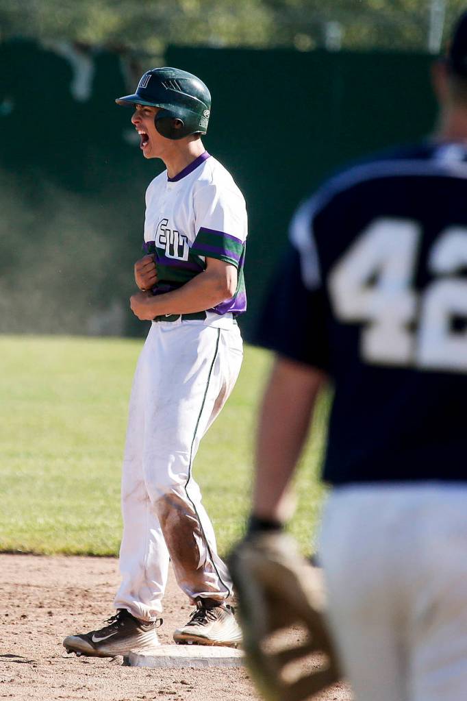 Edmonds-Woodway&rsquo;s Julian Kodama celebrates a double during a 3A state playoff game against Arlington on May 20, 2017, at Dream Field in Mount Vernon. (Ian Terry / The Herald)