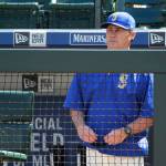 Mariners manager Scott Servais watches from the dugout in the fourth inning of Sunday&rsquo;s game in Seattle. (AP Photo/Ted S. Warren)