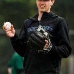 Edmonds-Woodway pitcher Nick Hull warms up his arm during a team practice at the school on May 25, 2017. (Ian Terry / The Herald)
