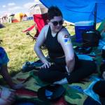 Oak Sonfist (center) admires her body paint while hanging out with her friends Olivia Caron-Noble (left) and Haley Irving (right) on the first of three days during the annual Sasquatch! Music Festival on Friday, May 26, 2017 in George, Wa. (Daniella Beccaria / For the Herald )