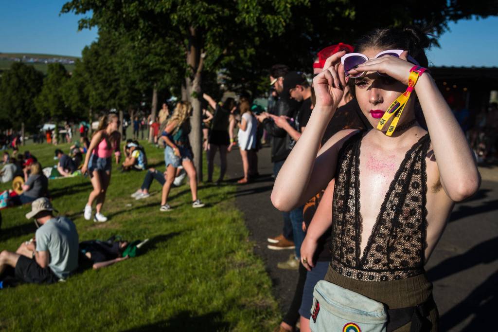 A festivalgoer surveys the hill near the main stage on the first of three days during the annual Sasquatch! Music Festival on Friday, May 26, 2017 in George, Wa. (Daniella Beccaria / For the Herald )
