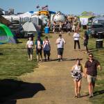 Festivalgoers make their way through the campgrounds on the first of three days during the annual Sasquatch! Music Festival on Friday, May 26, 2017 in George, Wa. (Daniella Beccaria / For the Herald )