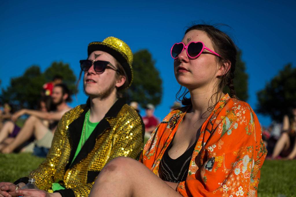 Quinn Mazure and Emily Tierney enjoy the music on the hill near the main stage on the first of three days during the annual Sasquatch! Music Festival on Friday, May 26, 2017 in George, Wa. (Daniella Beccaria / For the Herald )