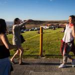 Kristina Dziedzic (right) points to her friend Liz Todd while dancing near the main stage on the first of three days during the annual Sasquatch! Music Festival on Friday, May 26, 2017 in George, Wa. (Daniella Beccaria / For the Herald )
