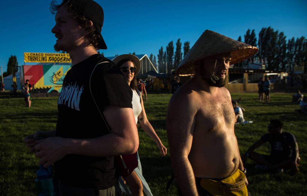 Festivalgoers enjoy the sun on the first of three days during the annual Sasquatch! Music Festival on Friday, May 26, 2017 in George, Wa. (Daniella Beccaria / For the Herald )
