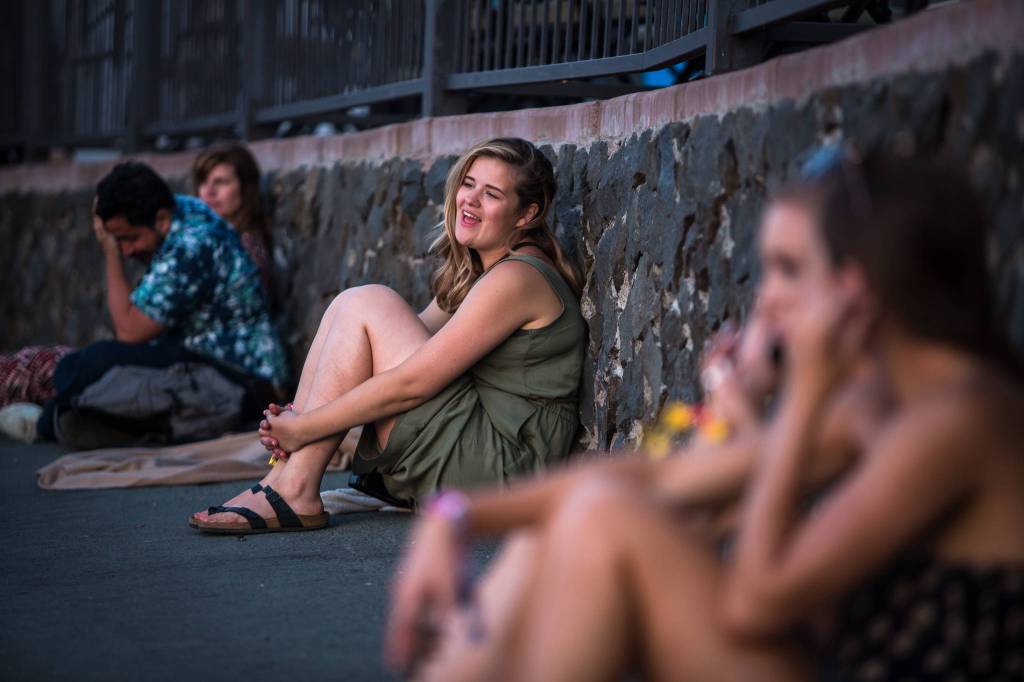 Helen Alley (center) sings along to The Head and the Heart at the main stage on the first of three days during the annual Sasquatch! Music Festival on Friday, May 26, 2017 in George, Wa. (Daniella Beccaria / For the Herald )