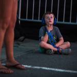 Gavin Green, 6, hangs out near the main stage on the first of three days during the annual Sasquatch! Music Festival on Friday, May 26, 2017 in George, Wa. (Daniella Beccaria / For the Herald )