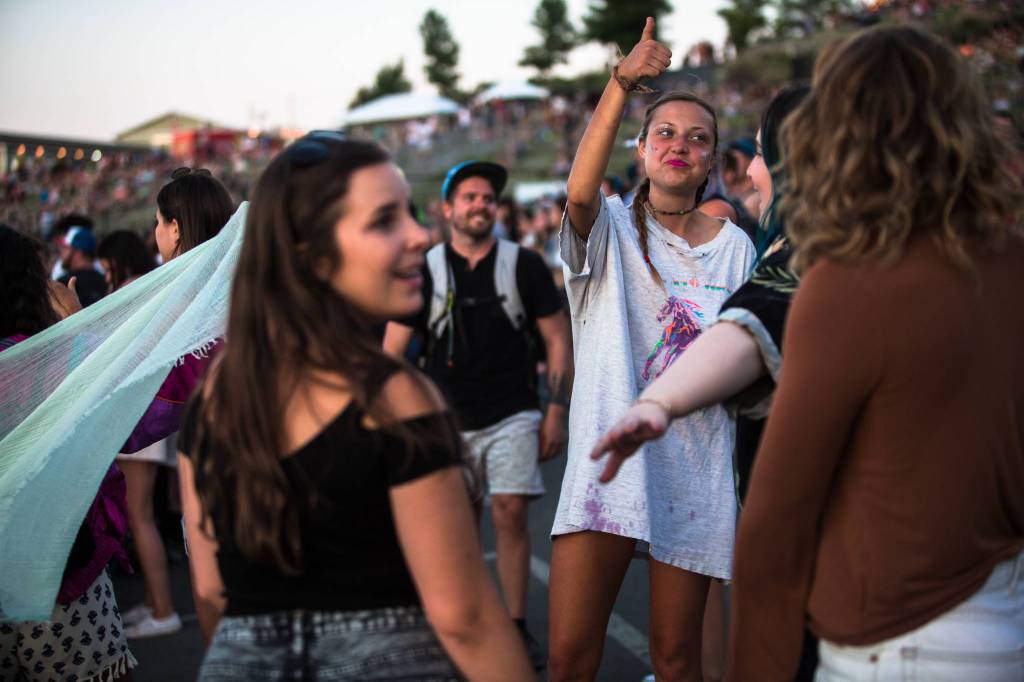 Festivalgoers dance near the main stage on the first of three days during the annual Sasquatch! Music Festival on Friday, May 26, 2017 in George, Wa. (Daniella Beccaria / For the Herald )