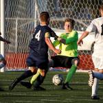 Glacier Peak&rsquo;s Miles Johnston has his shot blocked by Todd Beamer goalkeeper Brandon Locke (center right) during a state 4A semifinal game at Sparks Stadium in Puyallup on Friday, May 26. After the two teams battled to a 2-2 draw in regulation, Todd Beamer won after a penalty shootout. (Ian Terry / The Herald)