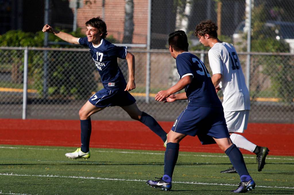 Glacier Peak&rsquo;s Keegan Rubio (left) celebrates his goal in the first half of a state 4A semifinal game at Sparks Stadium in Puyallup on Friday, May 26. After the two teams battled to a 2-2 draw in regulation, Todd Beamer won after a penalty shootout. (Ian Terry / The Herald)