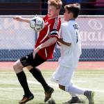 Snohomish&rsquo;s Jason Fairhurst (left) fights for possession of a ball with Gig Harbor&rsquo;s Tyler Meyer during a 3A state semifinal match on May 26, 2017, at Sparks Stadium in Puyallup. Snohomish beat Gig Harbor 4-3 to advance to the state championship game. (Ian Terry / The Herald)