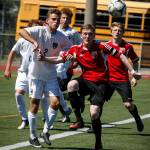 Snohomish&rsquo;s Jason Fairhurst (right) battles for position with Gig Harbor&rsquo;s Kenny Brooks during a 3A state semifinal game on May 26, 2017, at Sparks Stadium in Puyallup. Snohomish beat Gig Harbor 4-3 to advance to the state championship game. (Ian Terry / The Herald)