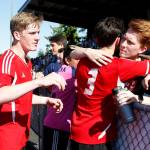 Snohomish&rsquo;s Jason Fairhurst (left) and Jordan Miller (3) are greeted by fans following their 2-0 loss to Roosevelt in the 3A State Championship at Sparks Stadium in Puyallup on Saturday, May 27. (Ian Terry / The Herald)