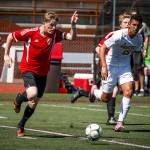 Snohomish&rsquo;s Jason Fairhurst (left) points before trying to pass to a teammate during the 3A state championship match against Roosevelt on May 27, 2017, at Sparks Stadium in Puyallup. (Ian Terry / The Herald)