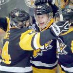 Pittsburgh&rsquo;s Jake Guentzel (center) celebrates his first of two goals in the Penguins&rsquo; 4-1 win over Nashville in Game 2 of the Stanley Cup finals Wednesday in Pittsburgh. (AP Photo/Gene J. Puskar)