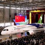 The first twin-engine 158-seat C919 passenger plane made by The Commercial Aircraft Corp. of China is pulled out of the company&rsquo;s hangar during a ceremony in Shanghai, China, in 2015. (AP Photo)