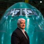 Engineer Bill Rietkerk in front of a Boeing 747-8 in the Everett factory on May 17. Rietkerk has been with the company since the Everett plant was built in 1967. (Andy Bronson / The Herald)