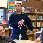 Adnan Kez has the class in stitches as he accidentally says he has three wives when he meant to say three children. He and his wife, Jaymin Shaekhah (right), are learning English at Emerson Elementary School. (Andy Bronson / The Herald)