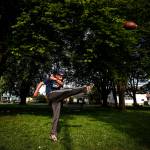 Mike Wise, a former high school nose guard, punts a football to friends on Wednesday, May 10 in Everett&rsquo;s Clark Park. Wise, who is homeless, spends a lot of time at the park and often picks up litter left by other park users. &ldquo;If I see somebody hungry, I&rsquo;ll volunteer my food stamps to get them something to eat,&rdquo; Wise said. (Ian Terry / The Herald)