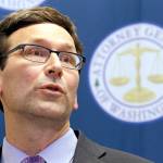 In this Feb. 9 photo, Washington Attorney General Bob Ferguson speaks at a news conference in Seattle. (AP Photo/Elaine Thompson, File)