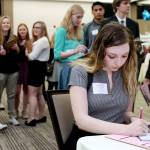 Memorial High School senior Taylor Wicks figures which life insurance plan to purchase during the Eau Claire Area Chamber of Commerce&rsquo;s Real Life Academy at the Lismore Hotel in Eau Claire, Wisconsin, earlier this year. It helps to know the basics if you&rsquo;re thinking about buying life insurance. (Marisa Wojcik / The Eau Claire Leader-Telegram)