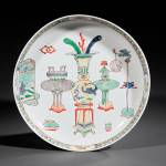 Dinnerware that pictures household objects or furnishings is not a new idea. The Chinese plate showing furniture auctioned for over $2,000. (Cowles Syndicate Inc.)
