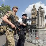 A member of the army joins a police officer to patrol London on Wednesday. (AP Photo/Tim Ireland)