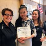 South Everett-Mukilteo Rotary President Cassie Franklin (from left) congratulates Mengwei Chen and her mother Yanhong Chen on the Kamiak High School senior&rsquo;s Student of the Month honor. (Contributed photo)