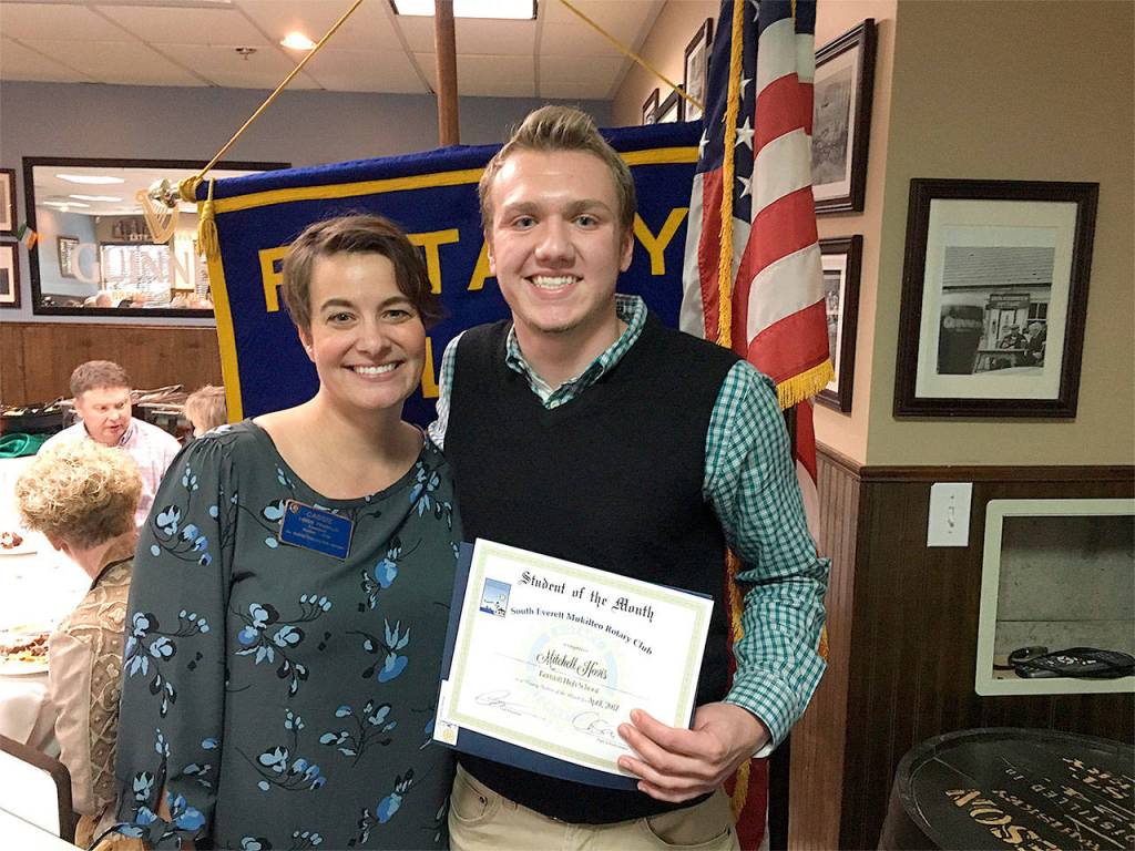 South Everett-Mukilteo Rotary Club President Cassie Franklin congratulates Mitchell Hovis as Student of the Month from Kamiak High School. (Contributed photo)