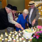 The Rotary Club of Everett celebrates its 100th year. Serving it up are past club presidents (from left) Ed Rubatino, Tom Rainville and Kathy DeTuerk, and current president Ed Petersen. (Contributed photo)