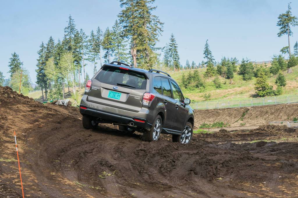 Taking on the curved, off-road turn at The Ridge Motorsports Park, the 2017 Subaru Forester 2.5i Touring was voted the best family utility vehicle of Mudfest by the Northwest Automotive Press Association. (Josh Mackey / NWAPA)