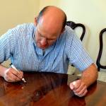 For tiny nicks and scratches, Keith Fritz sometimes uses a special furniture stain marker. (Photo by Brad Urban)