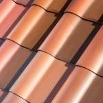 Detail of the terracotta solar roof tiles. (Tesla)