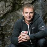 Swiss climber Ueli Steck poses at the foot of a climbing wall in Wilderswil, Canton of Berne, Switzerland, in 2015. (Christian Beutler/Keystone via AP)