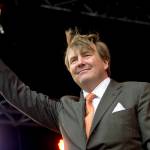 In this April 27 photo, Dutch King Willem-Alexander greets well-wishers during celebrations marking his 50th anniversary on Kingsday in Tilburg, south central Netherlands. King Willem-Alexander told national daily De Telegraaf in an interview published May 17 that he has ended his role as a regular &ldquo;guest pilot&rdquo; on KLM&rsquo;s fleet of Fokker 70 planes after 21 years and will retrain to fly Boeing 737s. (AP Photo/Peter Dejong, File)