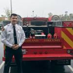 Snohomish County Fire District No. 22 Chief Travis Hots stands with a wildland slide with a 200-gallon water tank donated by the Firehouse Subs Public Safety Foundation. (Contributed photo)