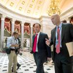 White House Chief of Staff Reince Priebus (center) walks near the House Chamber on Capitol Hill in Washington on Thursday, May 4. (AP Photo/Andrew Harnik)