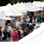 Visitors browse the hundreds of booths at the Edmonds Arts Festival. This year&rsquo;s festival is slated for June 16-18. (Herald file photo)
