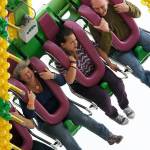 Passengers on the &ldquo;Freak Out&rdquo; ride (from left), Cheryl Bascher of Monroe, Naree Strickland of Mountlake Terrace and John Clarin of Seattle, scream and holler as they sail through the air at the 2015 Evergreen State Fair in Monroe. This year&rsquo;s fair is set for Aug. 24 through Sept. 4. (Herald file photo)