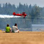 Vicky Benzing flies her 1940 Boeing Stearman during the two o&rsquo;clock airshow at the Arlington Fly-In. The event returns this year July 7-9. (Herald file photo)