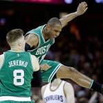 The Celtics&rsquo; Jonas Jerebko (8) celebrates with Al Horford (42) during the second half of Game 3 of the Eastern Conference finals on May 21, 2017, in Cleveland. (AP Photo/Tony Dejak)