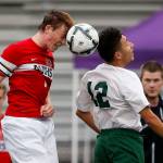 Archbishop Murphy&rsquo;s Matt Williams (left) and Quincy&rsquo;s Francisco Alejandrez go up for a header during the 2A championship game last season in Sumner. (Ian Terry / The Herald)